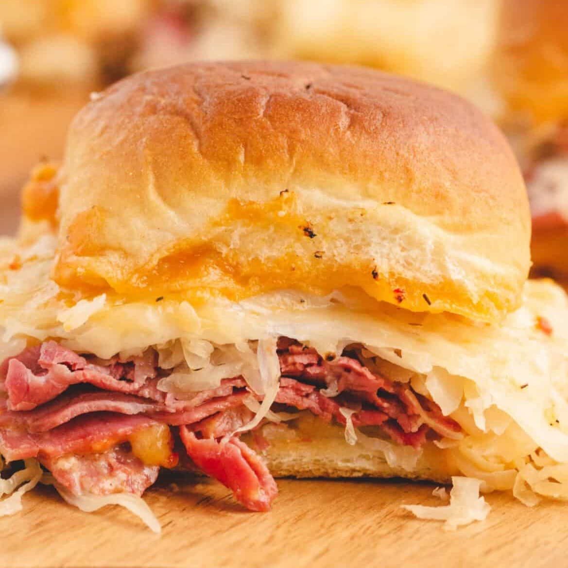 An image of a baked Rueben slider sandwich.