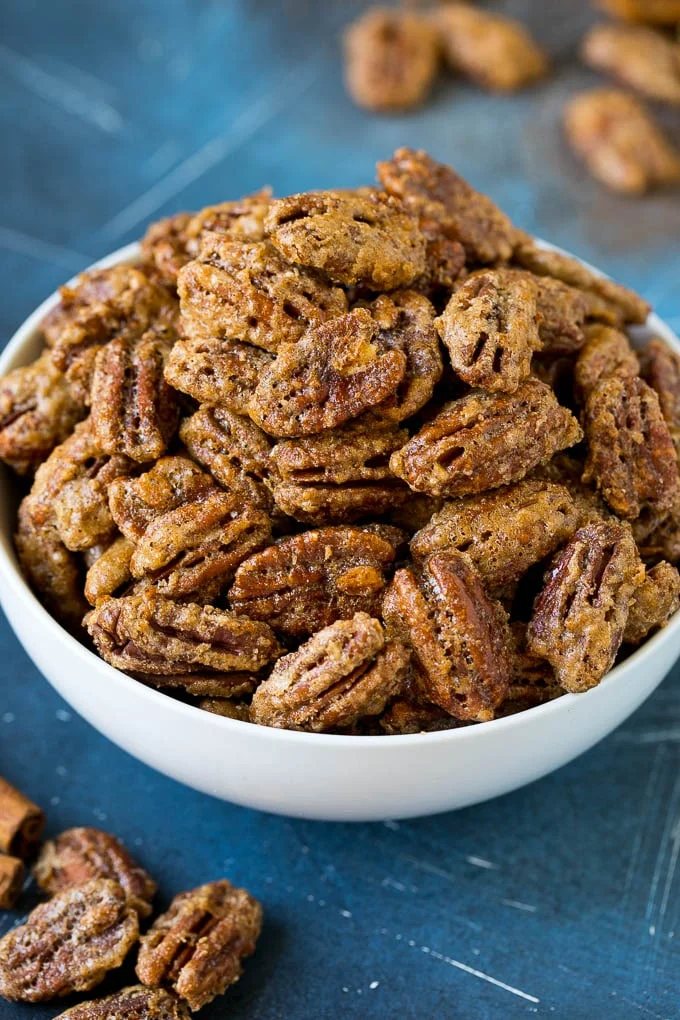 A bowl filled with kitchen-made candied pecans.