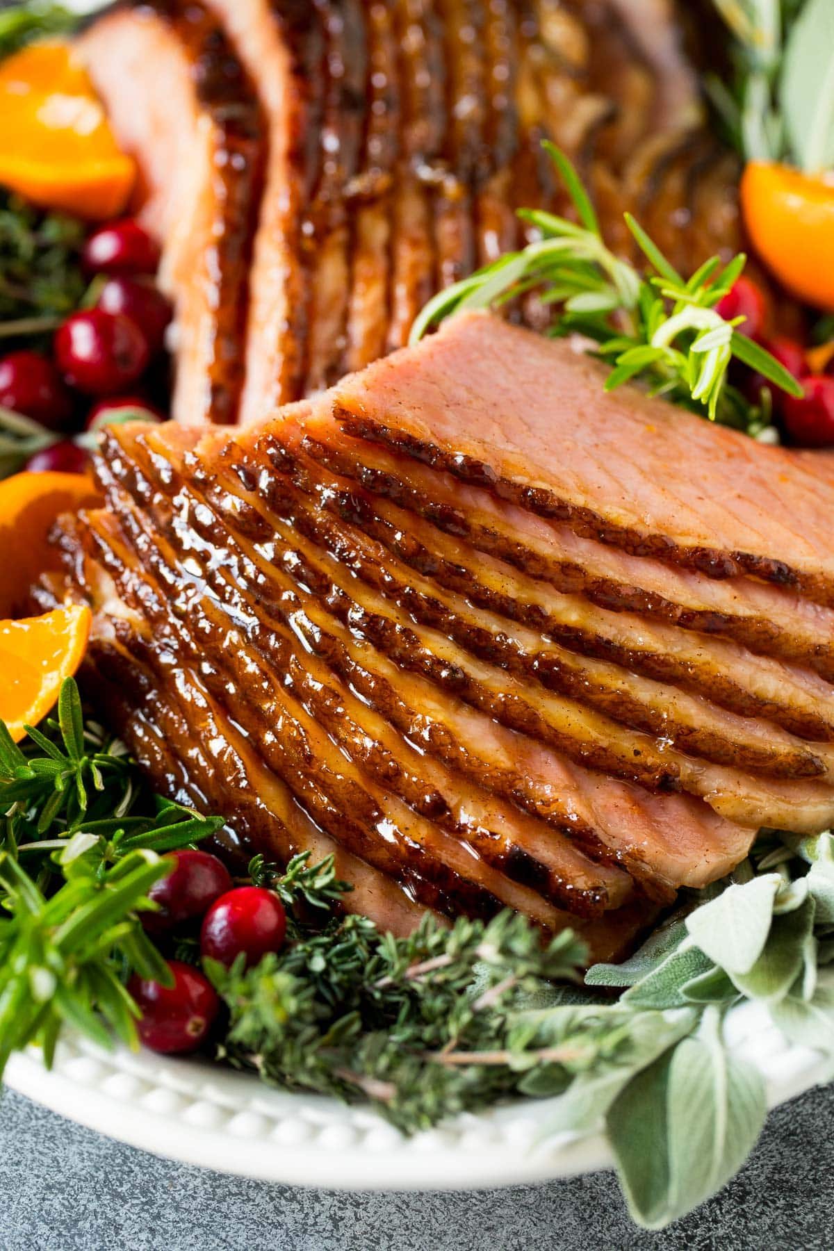 Sliced baked ham coated in brown sugar glaze.
