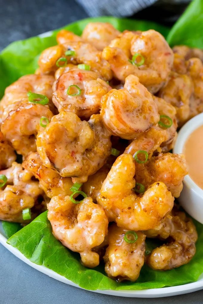 Bang bang shrimp tossed in silky chili sauce and served over lettuce.