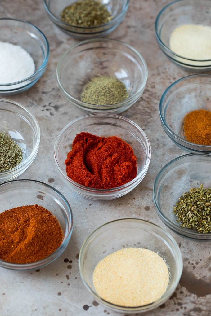 Small bowls of herbs and spices.