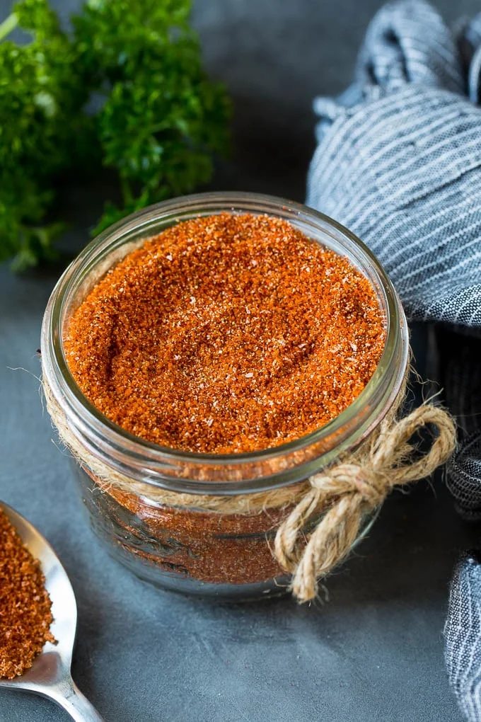 A jar of kitchen-made brisket rub spice mix.