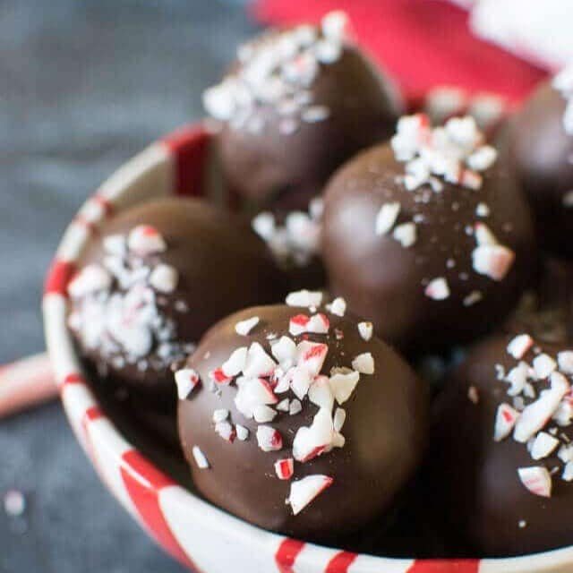 An image of candy cane sugar cookie truffles in a bowl.