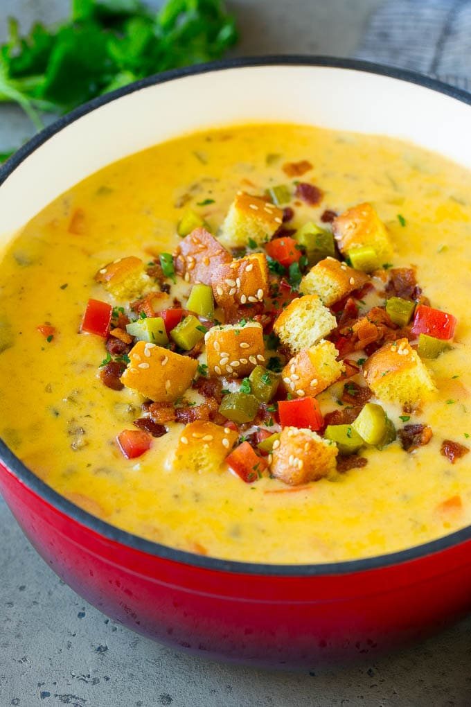 Cheeseburger soup topped with bacon, tomato, pickles and croutons.