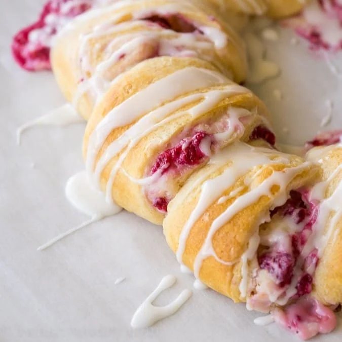 An image of a lemon raspberry cream cheese danish roll.