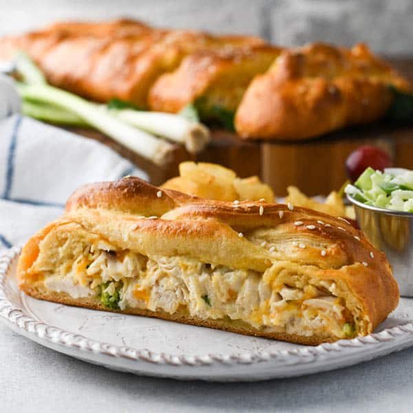 A picture of a chicken broccoli crescent braid slice on a plate.