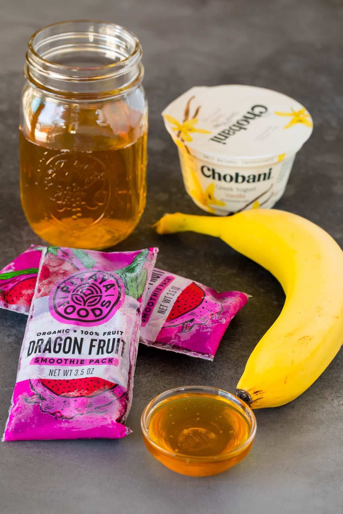 Honey, yogurt, banana, frozen fruit and apple juice.
