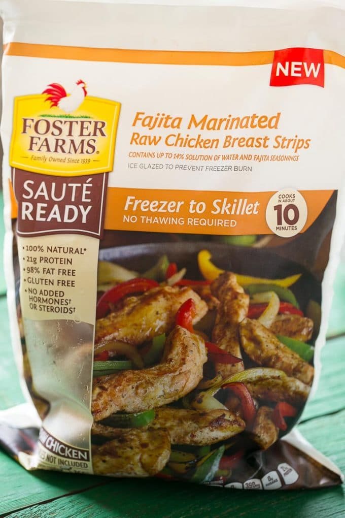 These fajita chicken cheesesteak sandwiches are full of spiced chicken, peppers and lots of cheese, all on a toasted roll.