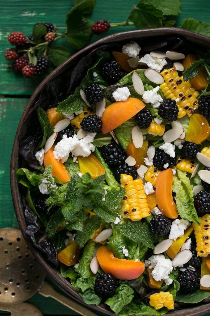 This blackberry apricot salad uses summer's finest produce and the creamy apricot poppyseed dressing is to die for!