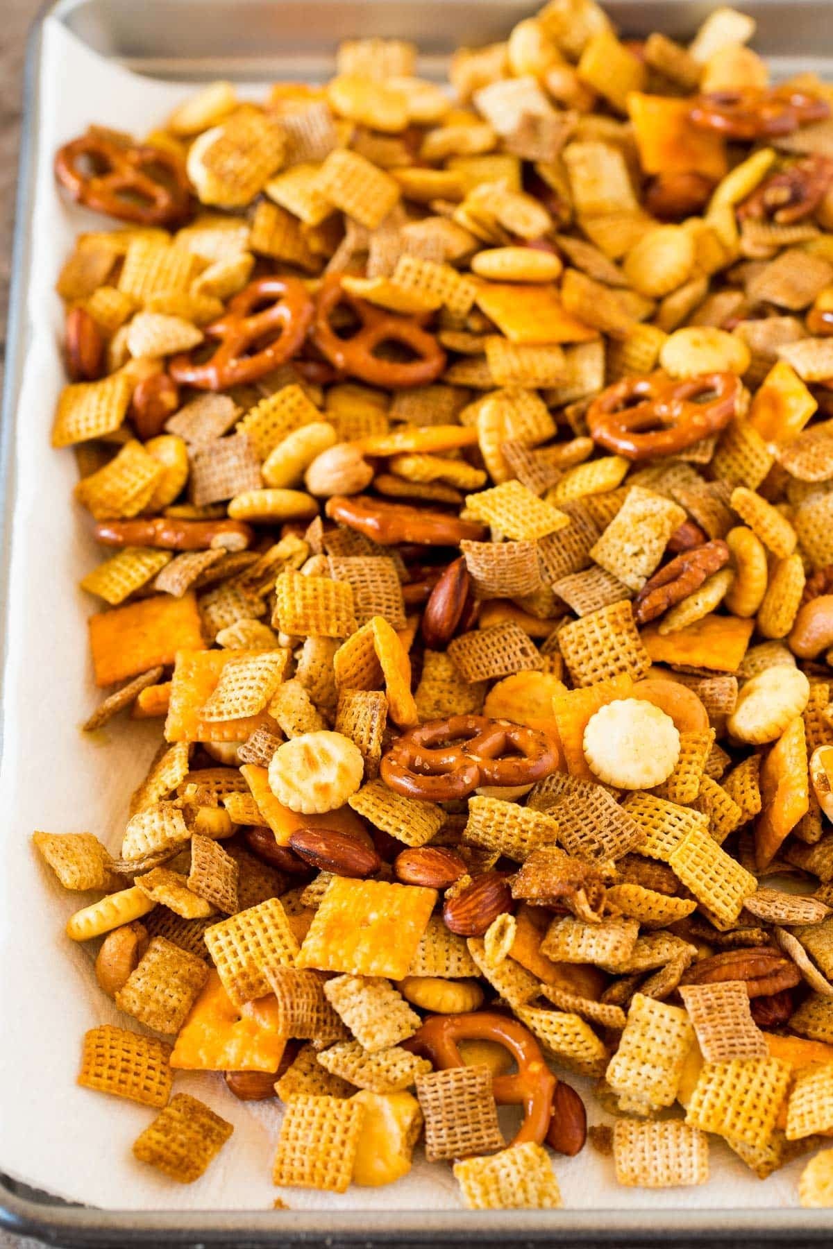 Party mix cooling on paper towels.