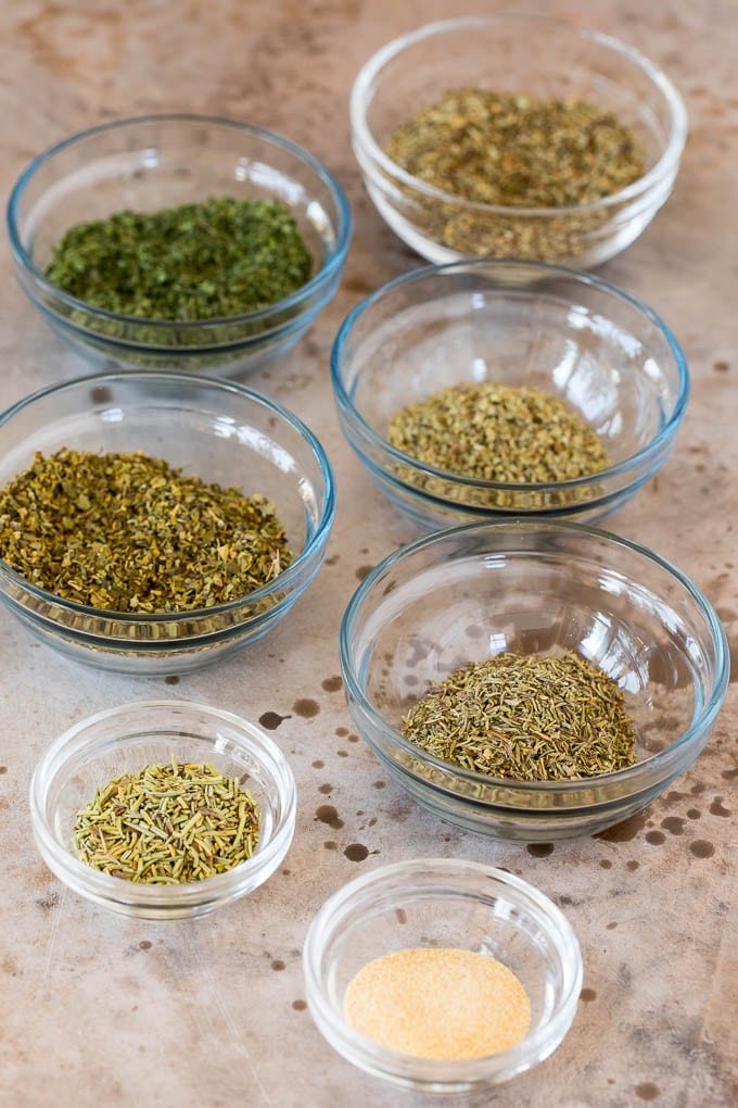 Small bowls of various herbs and spices.