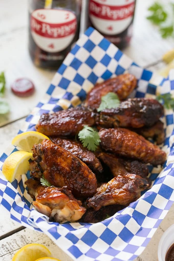 These sweet and tangy baked chicken wings are smothered in a kitchen-made barbecue sauce. They’re extra crunchy without any frying required! #OneOfAKindFan #ad