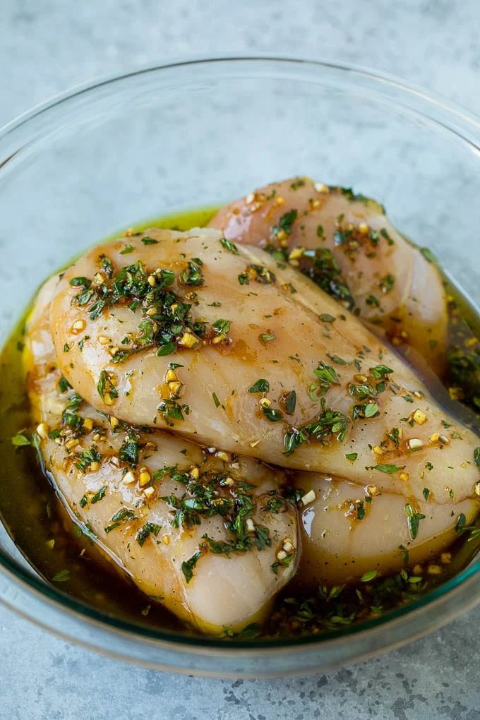 Poultry coated in garlic, herbs, lemon, soy sauce and olive oil.