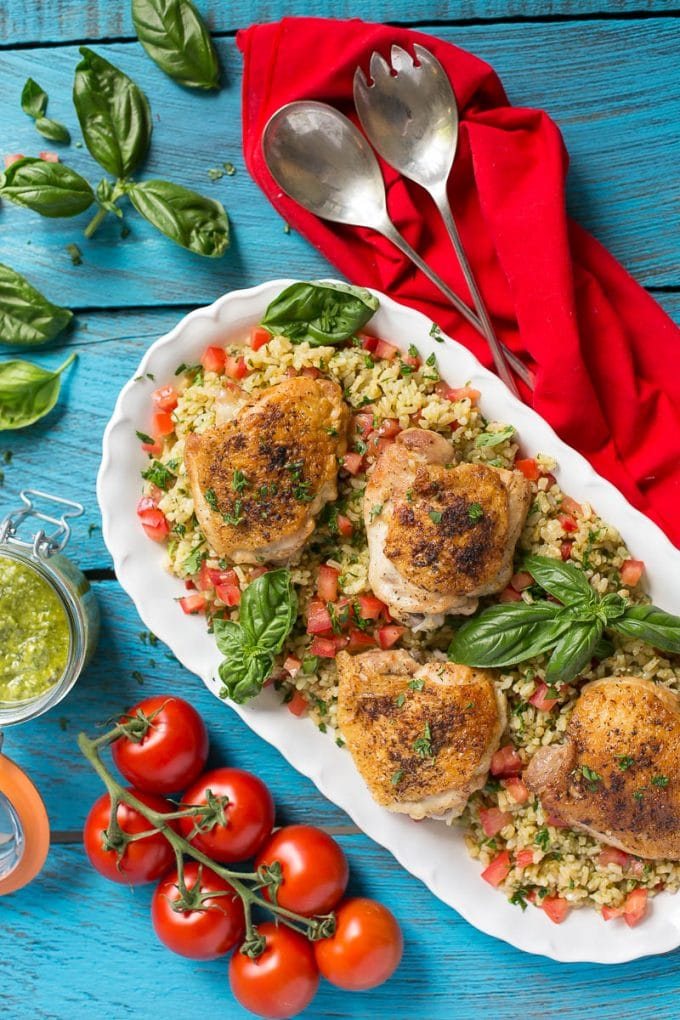 This one pot chicken with tomato basil risotto is the reliable weeknight meal - the whole thing bakes in the oven in a single dish!