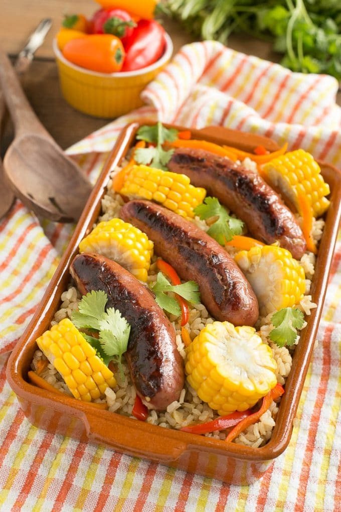 This sausage and rice bake is full of summer vegetables and is a complete meal in one pot!