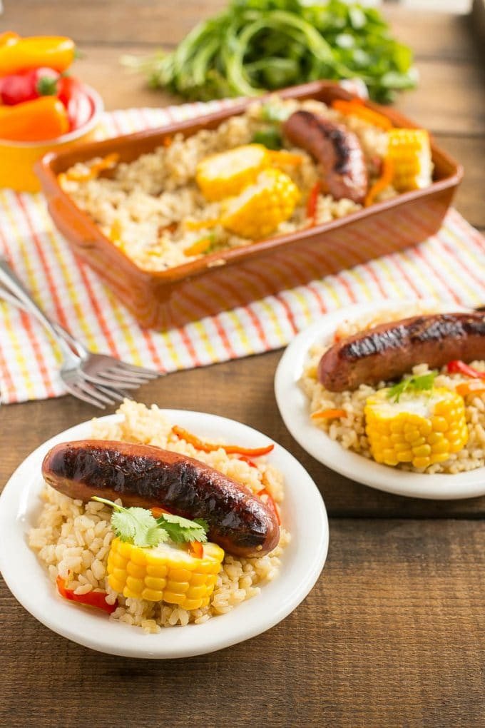 This sausage and rice bake is full of summer vegetables and is a complete meal in one pot!