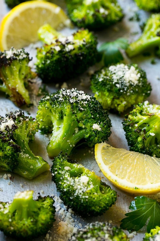 This parmesan roasted broccoli is seasoned with olive oil, parmesan and herbs. Put it in a hot oven and cook until tender and browned for the finest broccoli you'll ever have!