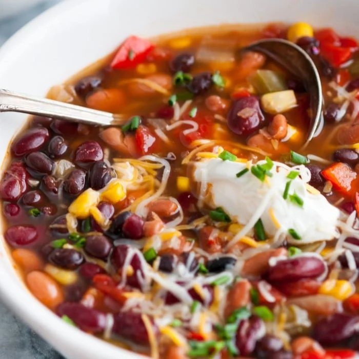 An image of a bowl of three bean chili.