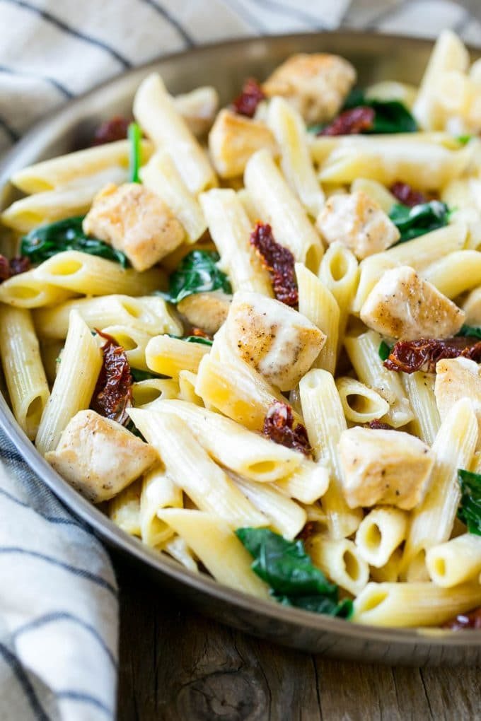 Sun dried tomato pasta with chicken and spinach in a silky sauce.
