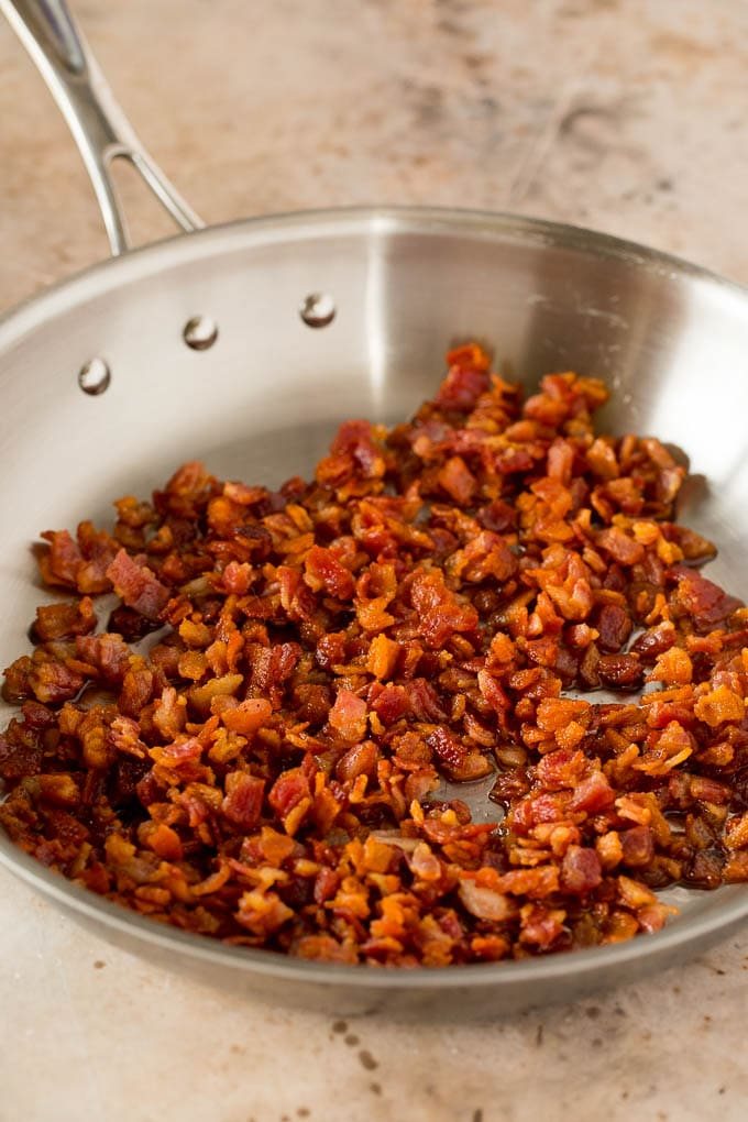 Cooked bacon in a skillet.