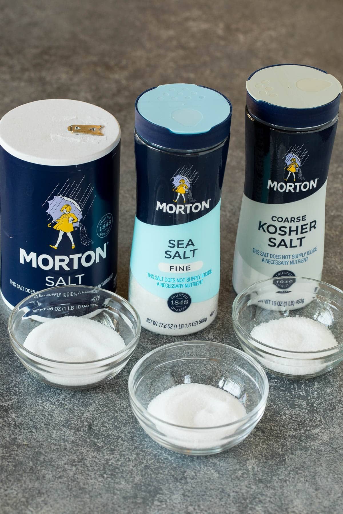 Bowls of different kinds of salt.