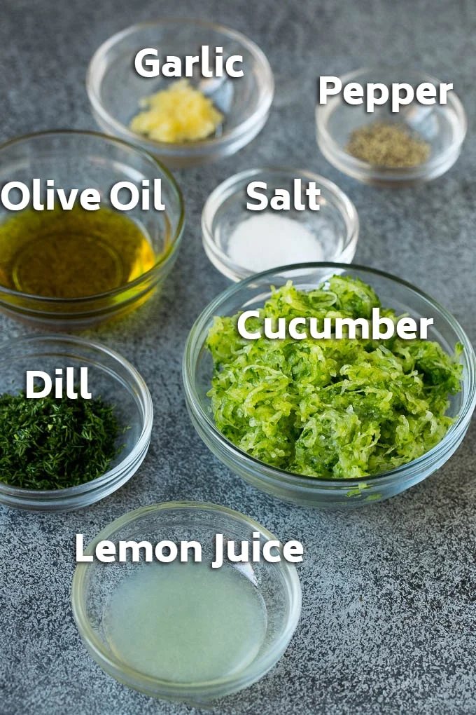 Bowls of ingredients to make tzatziki.