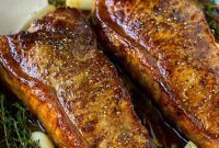 Juicy New York Strip Steak Topped with Garlic Butter