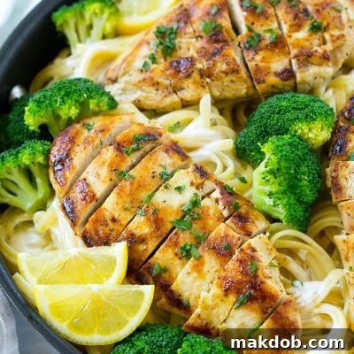 A pan of chicken and broccoli pasta in a creamy lemon sauce.