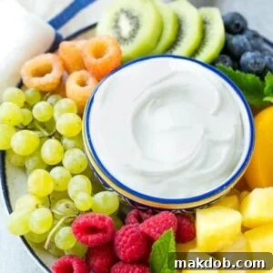 This light and creamy 3-ingredient cream cheese fruit dip is perfect with your favorite fruit, making a wholesome snack for any occasion.