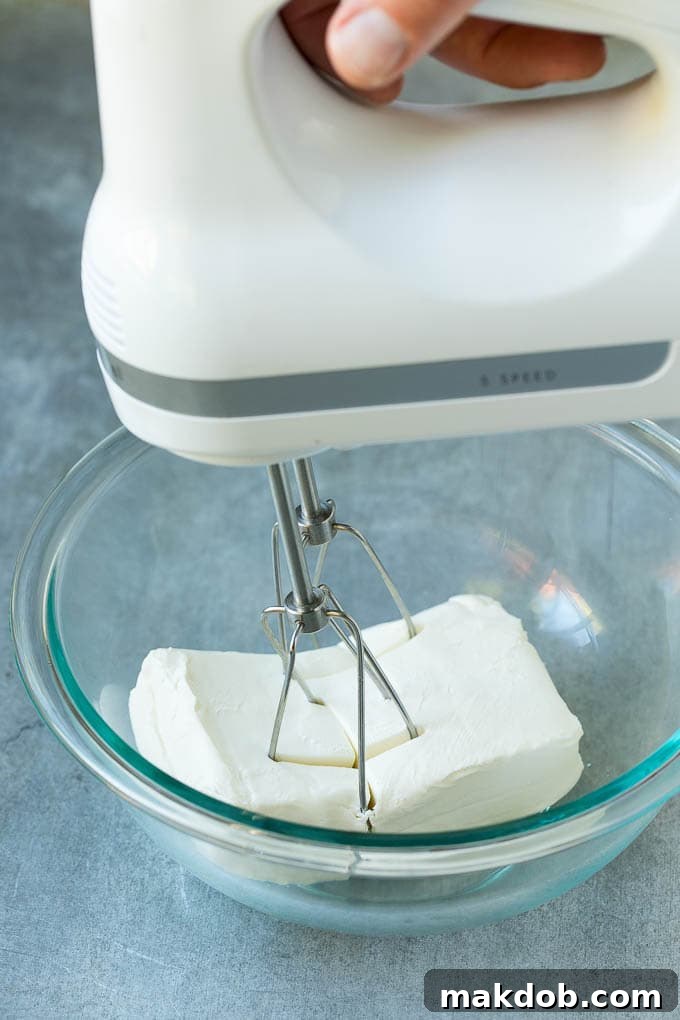 A mixer in a block of cream cheese.