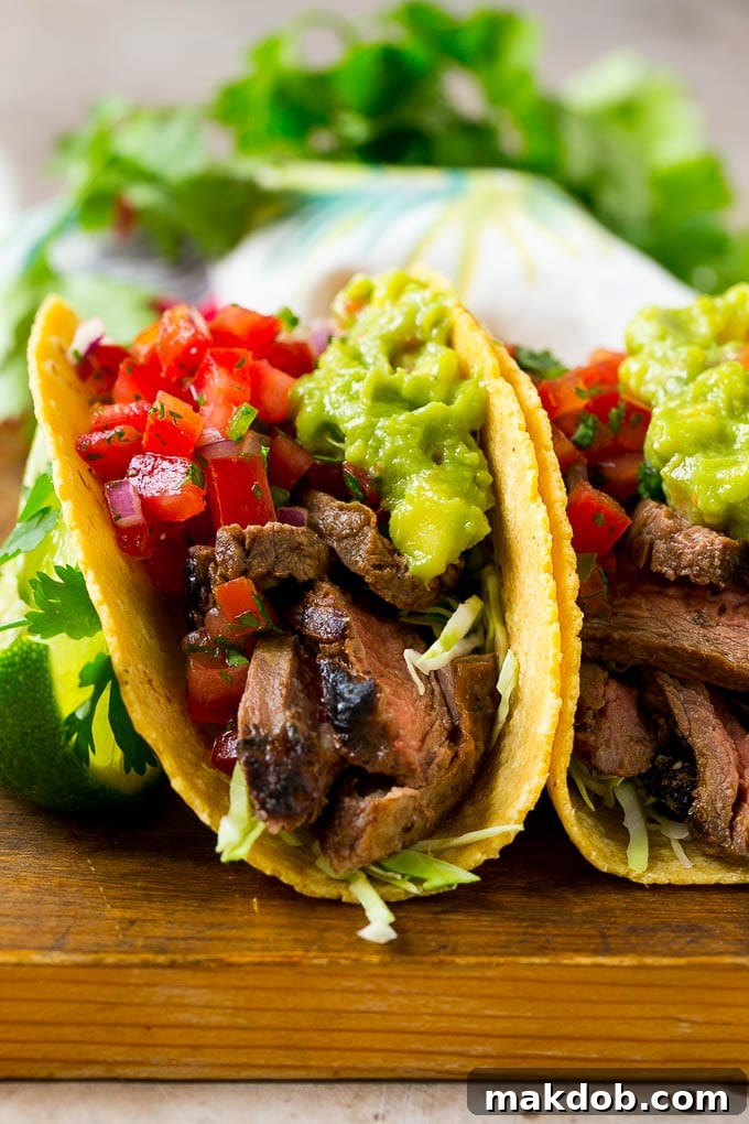 Sizzling Carne Asada Tacos 6 Carne asada tacos assembled in warm corn tortillas, generously topped with salsa and guacamole.