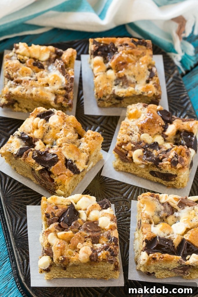 Making Rocky Ledge Bars: a simple brown sugar cookie base loaded with diverse mix-ins for an ultimate treat.