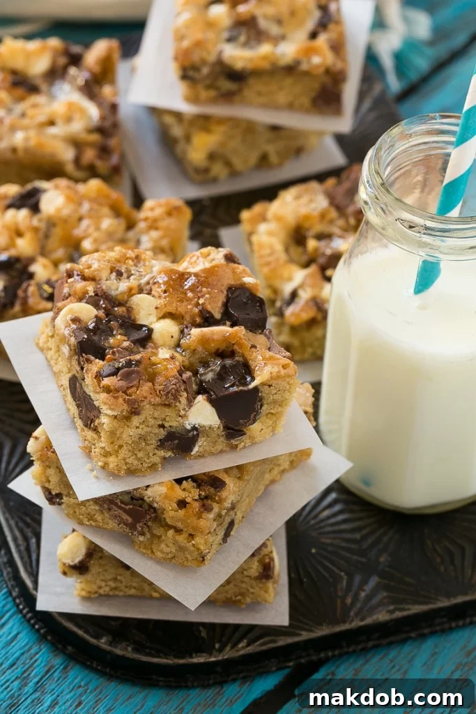 Versatile Rocky Ledge Bars: customize with various chocolates, toffee, marshmallows, and other favorite mix-ins.