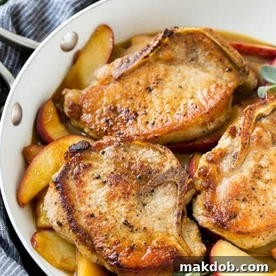 Orchard Pork Chops 2 A pan of apple pork chops.