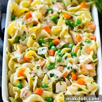 This chicken noodle casserole is diced chicken, veggies and egg noodles all in a creamy sauce.