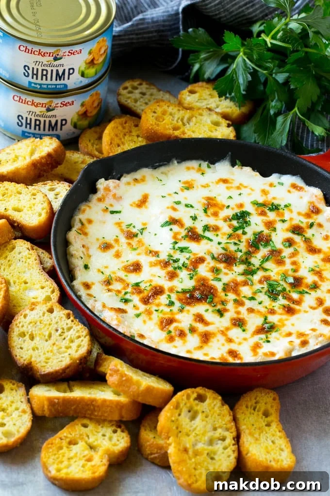 A creamy shrimp scampi dip served with croutons.