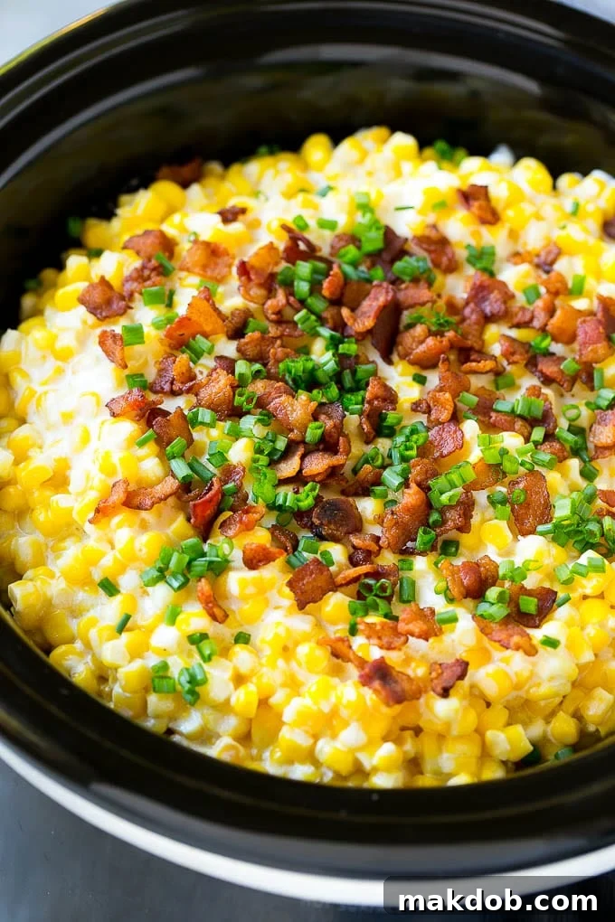 Slow cooker creamed corn with Bacon and sliced chives.