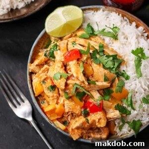 30 Creative Ways to Reinvent Leftover Turkey 28 An image of a turkey curry in a bowl with rice.