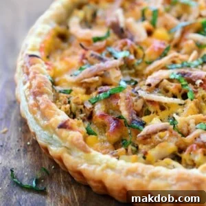 A picture of a pizza with Thanksgiving leftovers as toppings.