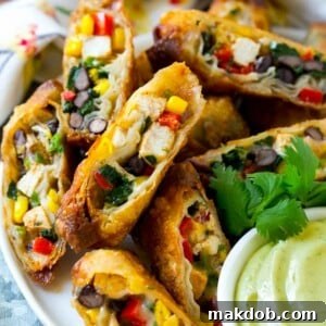 These southwestern egg rolls are loaded with a colorful variety of vegetables, chicken, beans and plenty of melty cheese, all wrapped up in a crispy roll. The ultimate party appetizer!