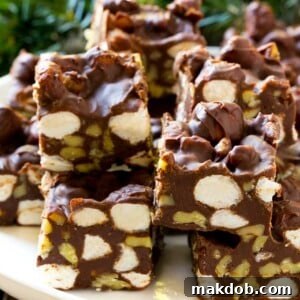 Rich Rocky Road Fudge, loaded with marshmallows and nuts, a classic and beloved sweet treat.