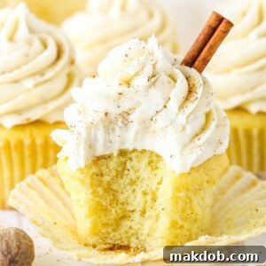 An image of an eggnog cupcake with the wrapper open.