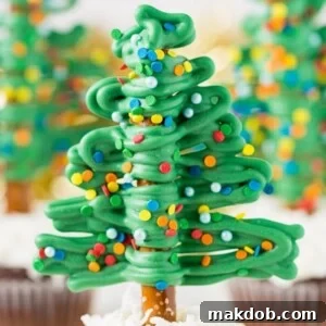 A picture of a Christmas tree cupcake.