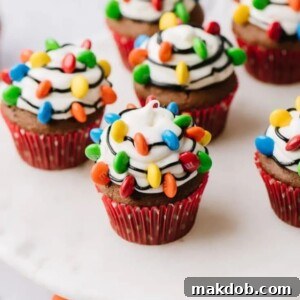A picture of several Christmas light cupcakes.