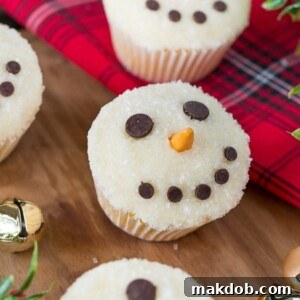 An image of some snowman cupcakes on a table.