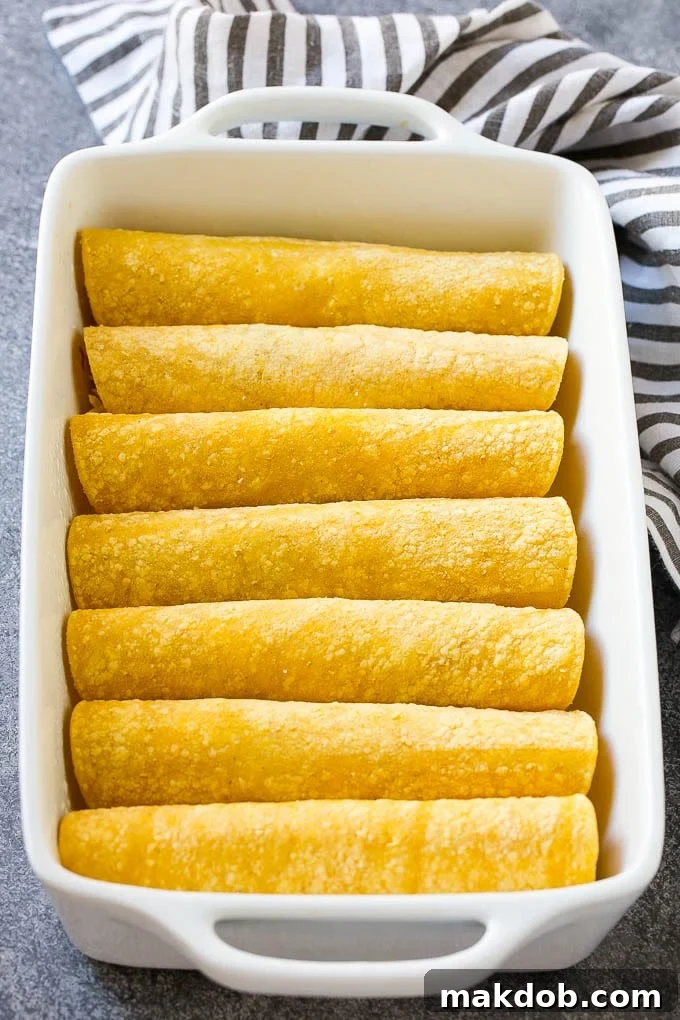 Corn tortillas filled with chicken and rolled up into enchiladas.