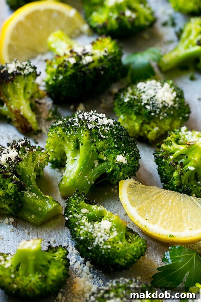 Crispy Parmesan Roasted Broccoli seasoned with olive oil and herbs, cooked until tender and golden brown.