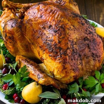 A whole herb roasted turkey is a show stopping main course for Thanksgiving or Christmas.