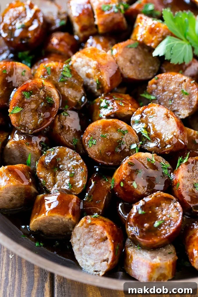 Beer Brat Bites Recipe | Sausage Appetizer | Bratwurst Recipe #sausage #bratwurst #appetizer #beer #dinneratthezoo These beer brat bites are coated in a sweet and savory beer brown sugar glaze for a simple yet delicious snack.