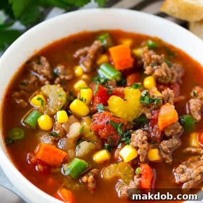 Loaded Burger Soup 7 Hamburger soup with potatoes and vegetables is an economical and easy meal option.